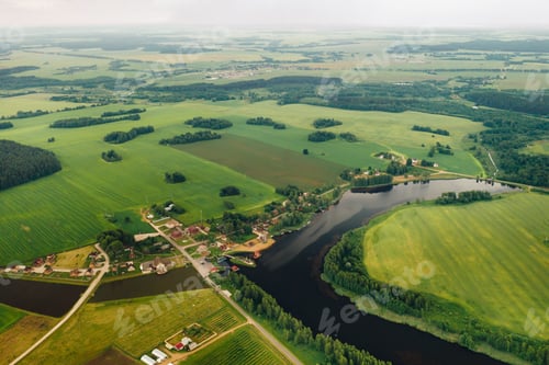 Preview: view from the height of the Lake in a green field in the form of a horseshoe and a village in the