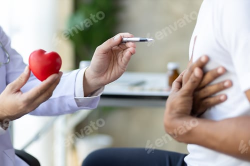 Preview: Man with chest pain is consulting a cardiologist at the hospital.