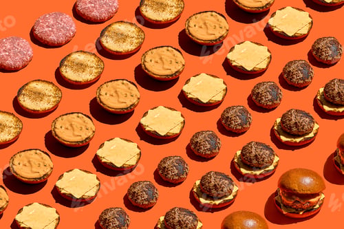 Preview: A pattern of burger ingredients going into a sandwich on an orange background.
