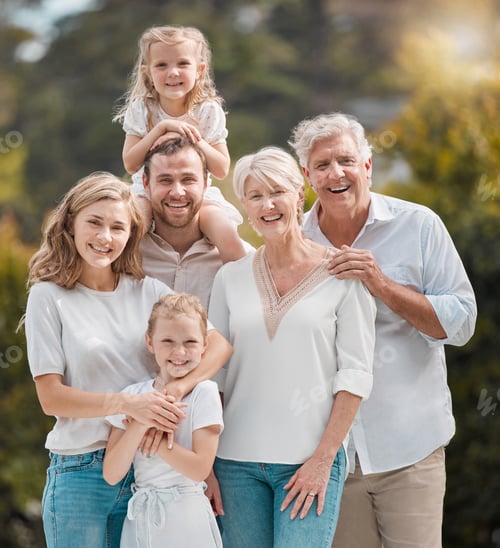 Preview: Mature and young family members outside in the garden. Happy smiling parents relaxing outside with