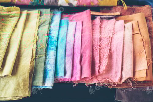 Preview: Collection of colorful textiles, soft pinks and blues