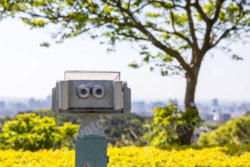 Preview: Tourist binoculars on mountain for sightseeing view
