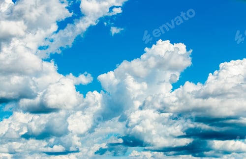 Clouds Floating in a Bright Blue Sky