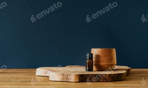 Preview: Wooden container and glass bottle on wooden desk