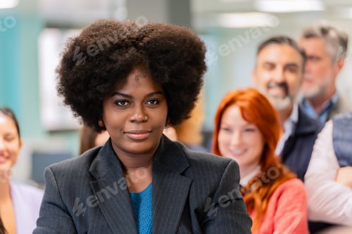 Preview: Confident woman leading a team discussion.