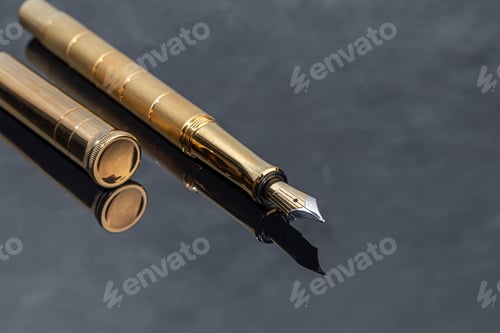 Preview: Fountain pen on a marble and gray background. Selective focus.