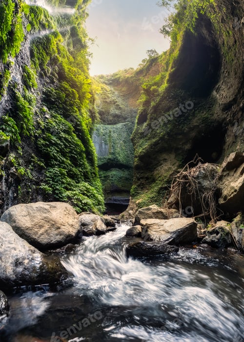 Preview: Majestic Madakaripura waterfall flowing in valley