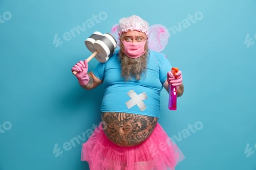 Preview: Horizontal shot of comic man works in cleaning service, acts fairy to entertain customers, wears pro