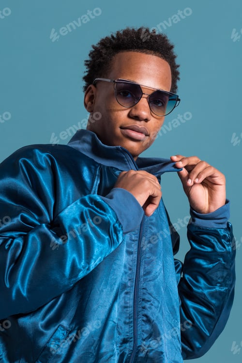 Preview: Anonymous black man in blue outfit