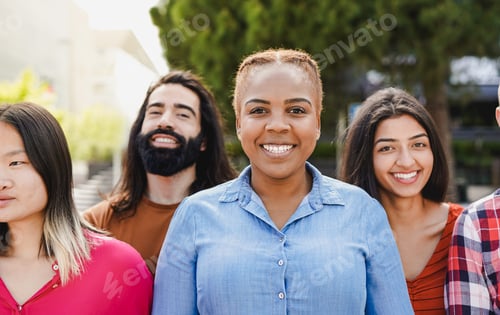 Preview: Young diverse friends smiling on camera - Multiracial people having fun together in the city