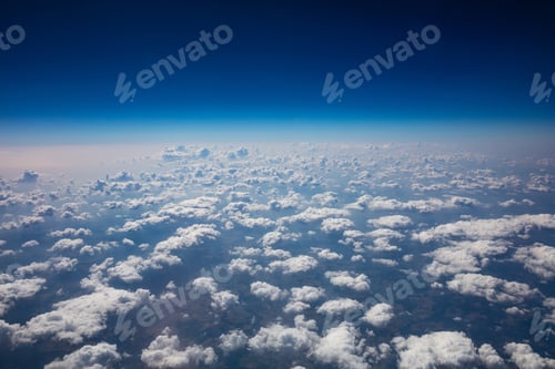 Preview: Cloudscape background. View out of an airplane window.