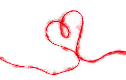 Preview: Thread isolated on a white background. Selective focus.