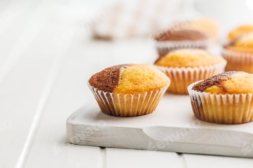 Preview: Close Up of a Muffin on a white Table