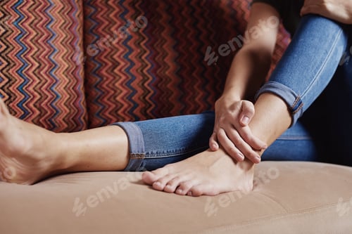 Preview: Woman have pain in leg, take ankle massage