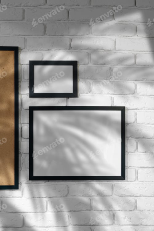 Preview: Black picture frame hanging on white brick wall copy space