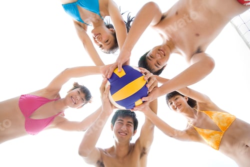 Preview: Friends playing beach volleyball