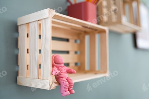 Preview: Wooden box shelf with decorations on the wall, natural decor concept.
