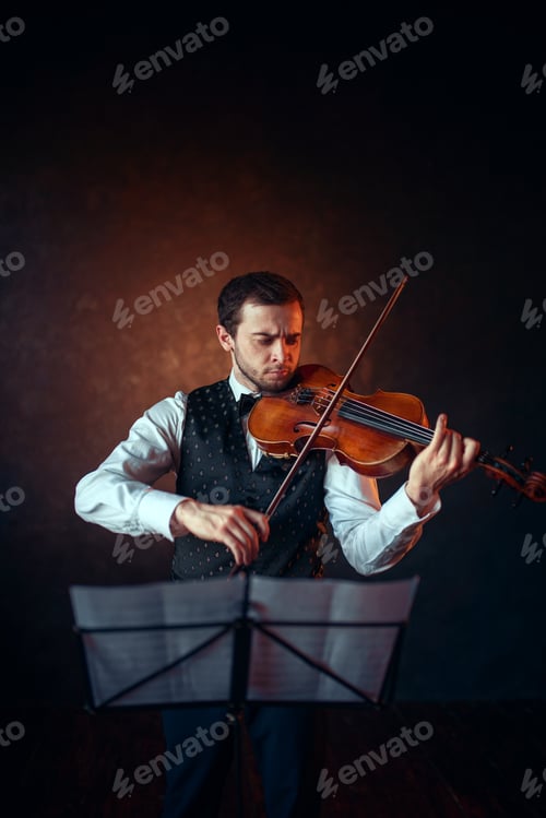 Preview: Male violinist playing classical music on violin