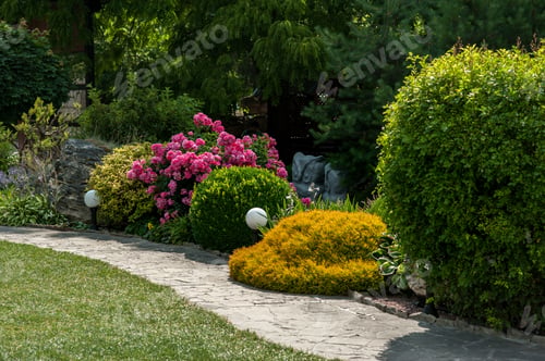Preview: landscape design with various bushes, conifers, colorful flowers on the wave alley and lanterns.