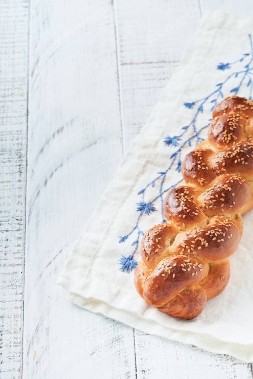 Preview: Challah bread. Sabbath kiddush ceremony composition. Freshly baked homemade braided challah bread fo