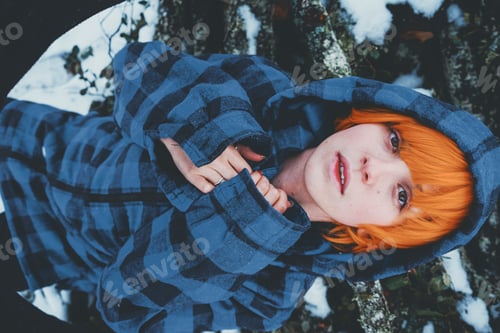 Preview: Redhead androgynous model in a winter scene