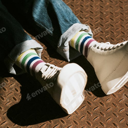 Preview: White high top sneakers on model casual style