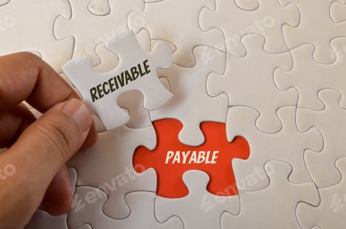 Puzzle Pieces Showing Receivable and Payable Concepts