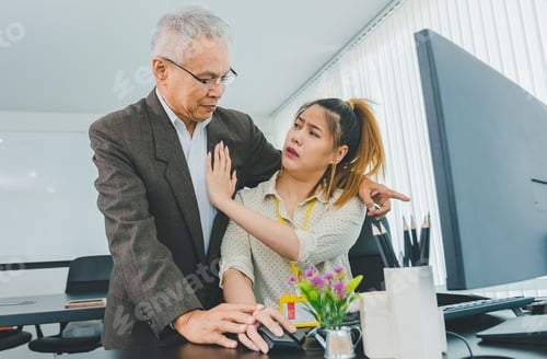 Preview: Boss or supervisor touching female employee's shoulder