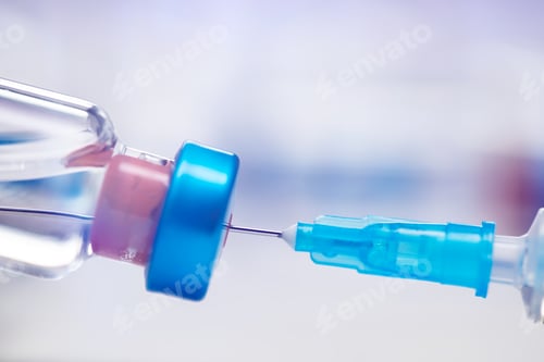 Preview: Close up on vaccine and medical syringe