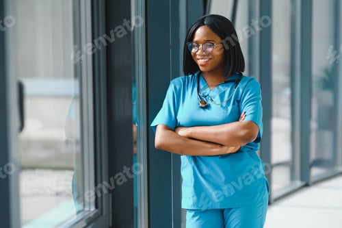 Preview: beautiful african american female pediatric nurse in modern office.