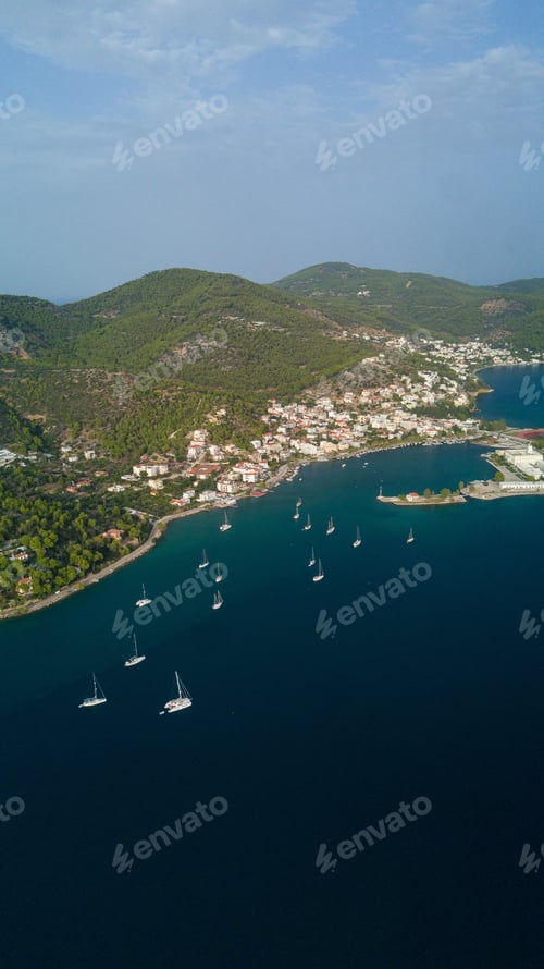 Preview: Vertical aerial shot of the beautiful island Poros, in Greece during daylight
