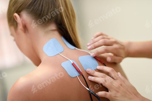 Preview: Electro stimulation in physical therapy to a young woman