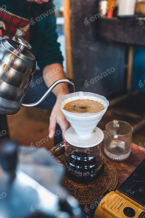 Preview: Drip coffee in a rustic coffee shop in the morning
