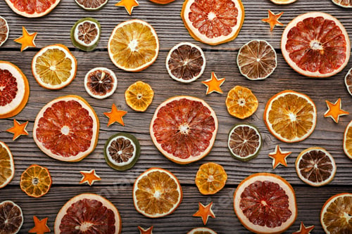 Preview: Dried citrus slices with orange peel stars on rustic wooden board