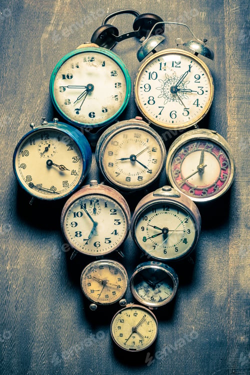 Preview: Old clocks in pile