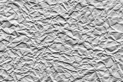 Preview: The Old Crumpled Sheet Of Paper Of Silvery Color For The Abstract Textured Background And For