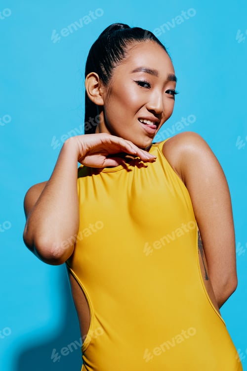Preview: Woman cute beauty portrait fashion surprised wow blue smile lifestyle yellow trendy
