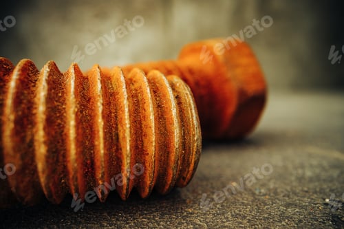 Preview: Old rusty bolt on grey background macro