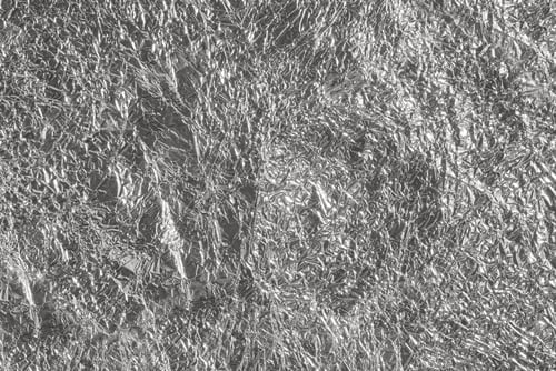 Preview: Crinkled shiny silver aluminum foil texture with intricate wrinkles
