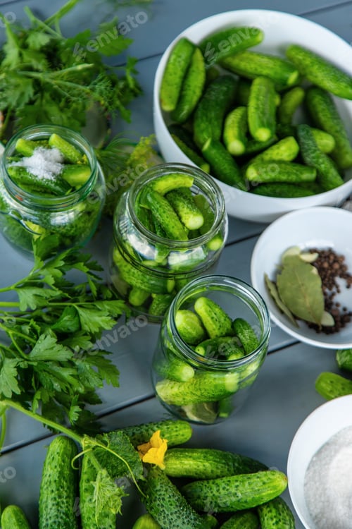 Preview: Preserving cucumbers in jars. Selective focus.