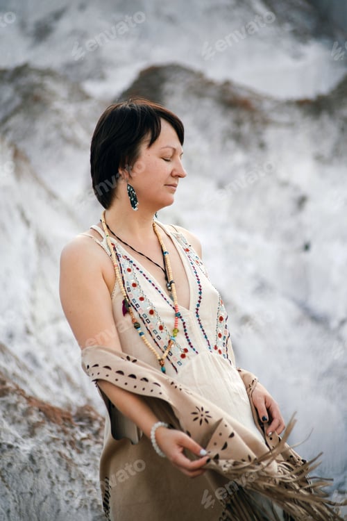 Preview: A portrait of woman is standing near with a mountain