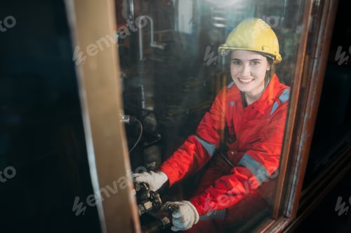 Preview: Portrait of Industrial engineers inspect and perform maintenance on the machines at factory.
