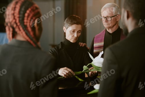 Preview: Pastor Supporting Widow at Funeral