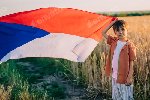 Preview: Czech little kid - patriot boy with national flag on nature background