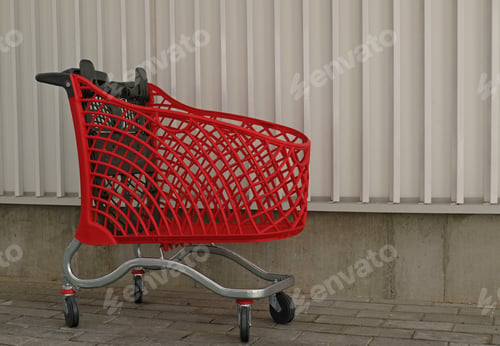 Preview: Empty red shopping on industrial wall background. Shop trolley at supermarket. Sale, discount, shopa