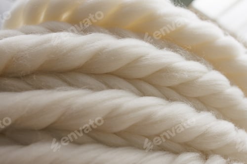 Preview: Undyed sheep wool roving close up for textile production and craft