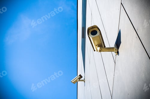 Preview: Security camera over blue sky