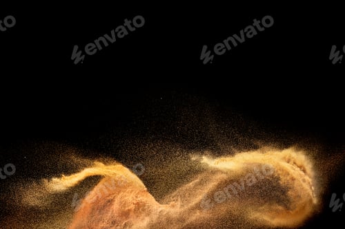 Preview: Brown sand explosion isolated on black background. Freeze motion of sandy dust splash.