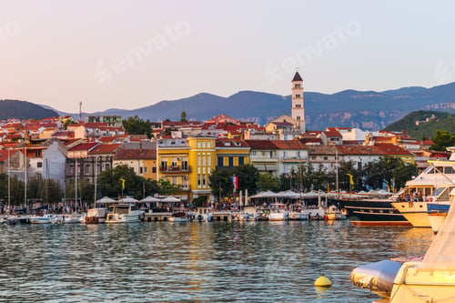 Preview: Scenic view of a Crikvenica harbor with buildings located on the shore