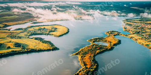 Preview: Aerial View Of Green Forest And Meadow Hill Landscape Near River. Top View Of Beautiful Nature From